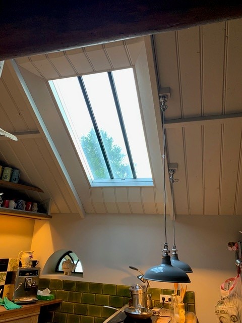 A conservation rooflight in a pitched roof extension
