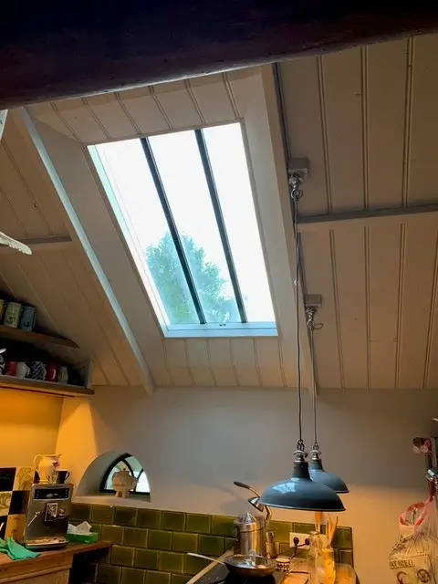 A conservation rooflight in a pitched roof extension