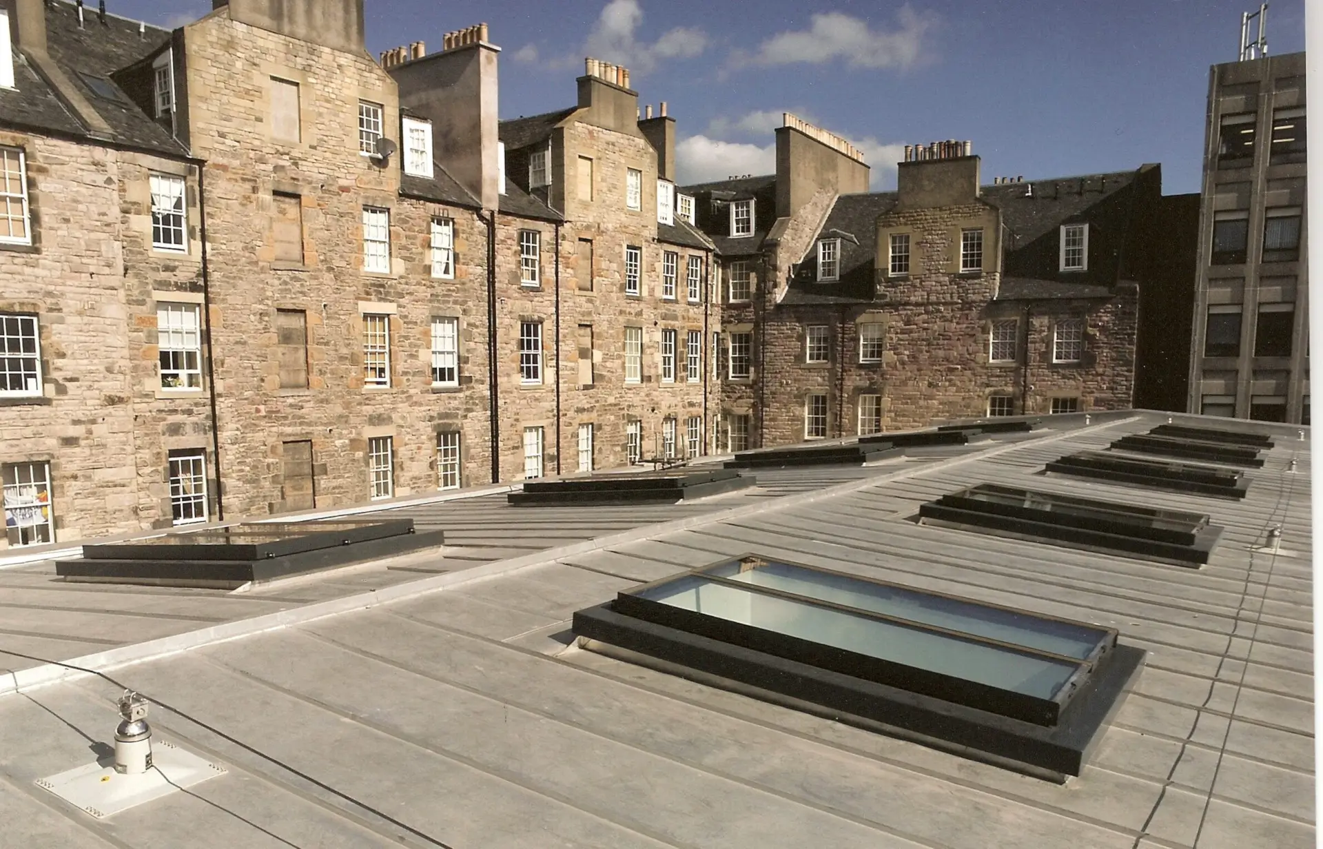 External view of Royal College of Surgeons showing surrounding buildings and Conservation Plateau Rooflights - Helpful Guides: Flat Rooflight Buying Guide. Flat Roof Collection